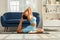 Side view of Asian woman doing Yoga exercise,Yoga One Legged King Pigeon pose or Eka Pada Rajakapotasana,Calm of healthy young