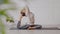 Side view of Asian woman doing Yoga exercise,Yoga One Legged King Pigeon pose or Eka Pada Rajakapotasana,Calm of healthy young