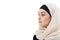 side view of attractive businesswoman in hijab looking away