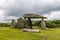 A side view of a balanced rock roof at the ancient burial chamber at Pentre Ifan in the Preseli hills in Pembrokeshire, Wales