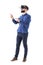 Side view of bearded business man gesticulating with hand and finger having virtual reality experience