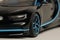 Side view of black Bugatti Chiron with blue trim toy car