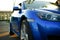 Side View of the Blue Sport Car, Mirror Close-up, Details of Automobile Concept