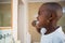 Side view of boy brushing teeth