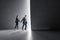 Side view of businessman and woman holding hands and stepping into the light from behind a concrete wall. Success, teamwork and