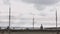 side view of cars and citizens passing over an old bridge in Tula, Russia - September 23, 2021