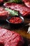 Side view Close up  on red pepper near machete Steak, Flank steak, cut near denver alternative beef steak and a cleaver butcher