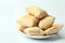 Side view closeup shot of a pile of square puff biscuits on a plate