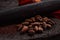 Side view of cocoa and cacao powder on a traditional metate, used in Mexican indigenous culture