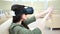 Side view concentrated happy woman enjoying using modern virtual reality glasses