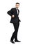 Side view of confident handsome man in tuxedo putting cellphone in coat pocket turning behind