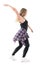 Side view of dance hall female dancer moving with spread arms while looking down and smile