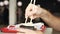 Side view of eating noodles with vegetables with chopsticks. Media. Close up of man eating vegetarian asian dish, wok