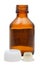 Side view of empty amber glass pharmacy bottle