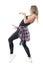 Side view of energetic female dance performer posture.