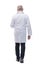 Side view. experienced doctor striding forward. isolated on a white