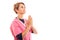 Side view of female vet wearing pink scrub showing praying gesture.