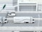 Side view of a fleet of self-driving electric semi trucks driving on highway