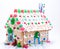 Side view of Gingerbread House with Gingerbread man in Window and Wreath over door