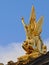 Side view of Golden statue of poetry on top of the opera of Paris, France