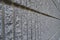 Side view of gray coarse cement wall background