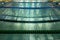 Side view at green, blue lane line in empty quiet swimming pool