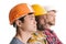 side view of group of multiethnic thoughtful construction workers