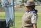 Side view of a high ranking female traffic police official wearing a hat
