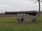 Side view of an historic cannon in the park in Rochester, Kent