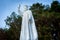 Side view of iconic Christ the King statue with raised hand at Glen of Aherlow, County Tipperary, Ireland.