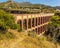 A side view of the majestic, four storey, Eagle Aqueduct that spans the ravine of Cazadores near Nerja, Spain