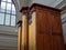 Side view of a massive oak 19th century pipe organ