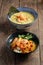 Side view matcha ramen and curry with langoustines