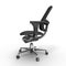 Side view of modern office chair from black fabric. Isolated on white. 3D illustration