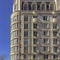 Side view on modern residential building with many sunlit balconies