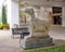 Side view of one of a pair of Chinese Tang Dynasty stone horses outside the World Trade Center in Dallas, Texas