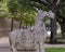 Side view of one of a pair of Chinese Tang Dynasty stone horses outside the World Trade Center in Dallas, Texas