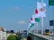 Side view of the Petofi bridge in Budapest, Hungary. Decorative flags. Blue sky. European travel concept