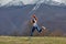 Side View Portrait Of Athlete Redhead Lady Jumping High During Training In Nature, Sportswoman