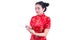 Side view portrait of Beautiful Young asian woman wear chinese dress traditional cheongsam or qipao using modern digital tablet