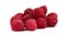 Side view on red natural raspberries scattered randomly on white background