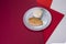 Side view of Roasted chicken fillet With boiled rice. Breakfast on colorful red background. Main and side dish in one plate.