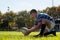 Side view of rugby player getting ready to kick for goal