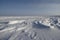 Side view of Sastrugi, wind carved ridges in the snow, near Arviat, Nunavut