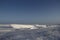 Side view of Sastrugi, wind carved ridges in the snow, near Arviat, Nunavut