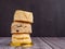 Side view of scones traditional English delicious fresh bake homemade on wooden table with dark vintage wall background.