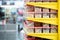 Side view of shelves with stacks of plastic containers