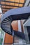 Side view of a spiral staircase pattern. Spiral stairs circle in courtyard architecture. Outdoor ladder decoration interior