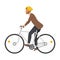 Side view of teacher wearing cyclists helmet riding bicycle to work