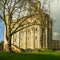 Side view of the Tower of London in autumn sunlight